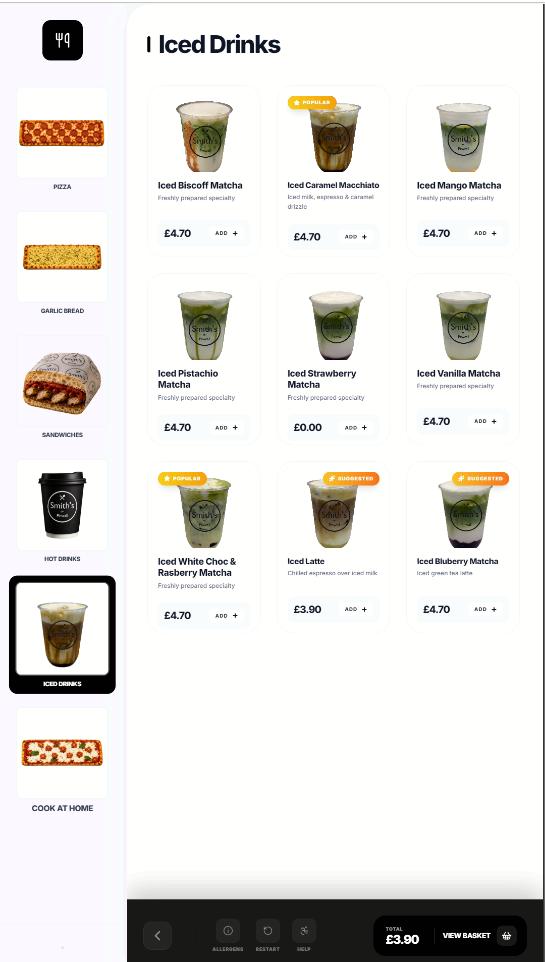 Posso self-order kiosk menu screen showing categories and iced drinks with prices for a UK coffee shop